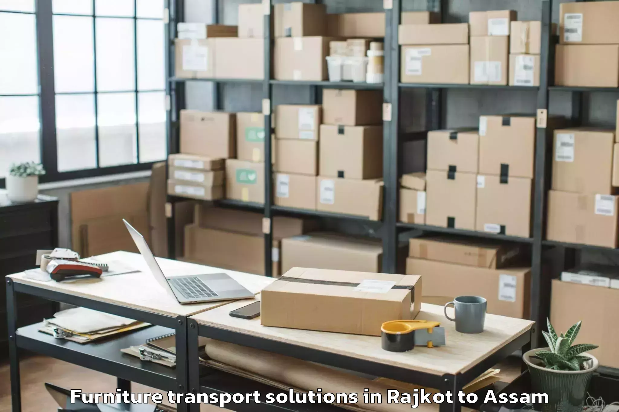 Book Rajkot to Bijni Pt Furniture Transport Solutions Online